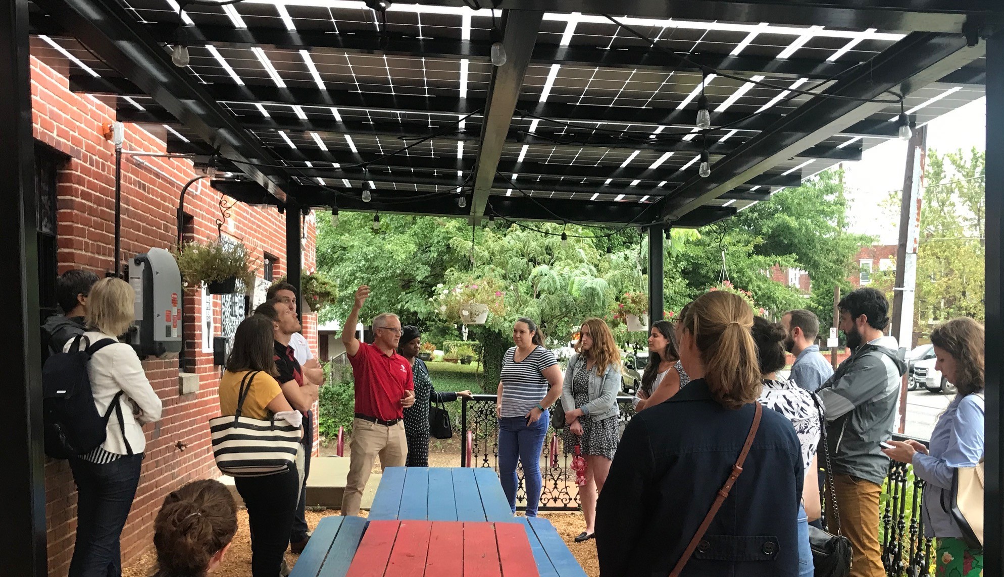 Attendees check out solar array at Right Proper Brewing Company