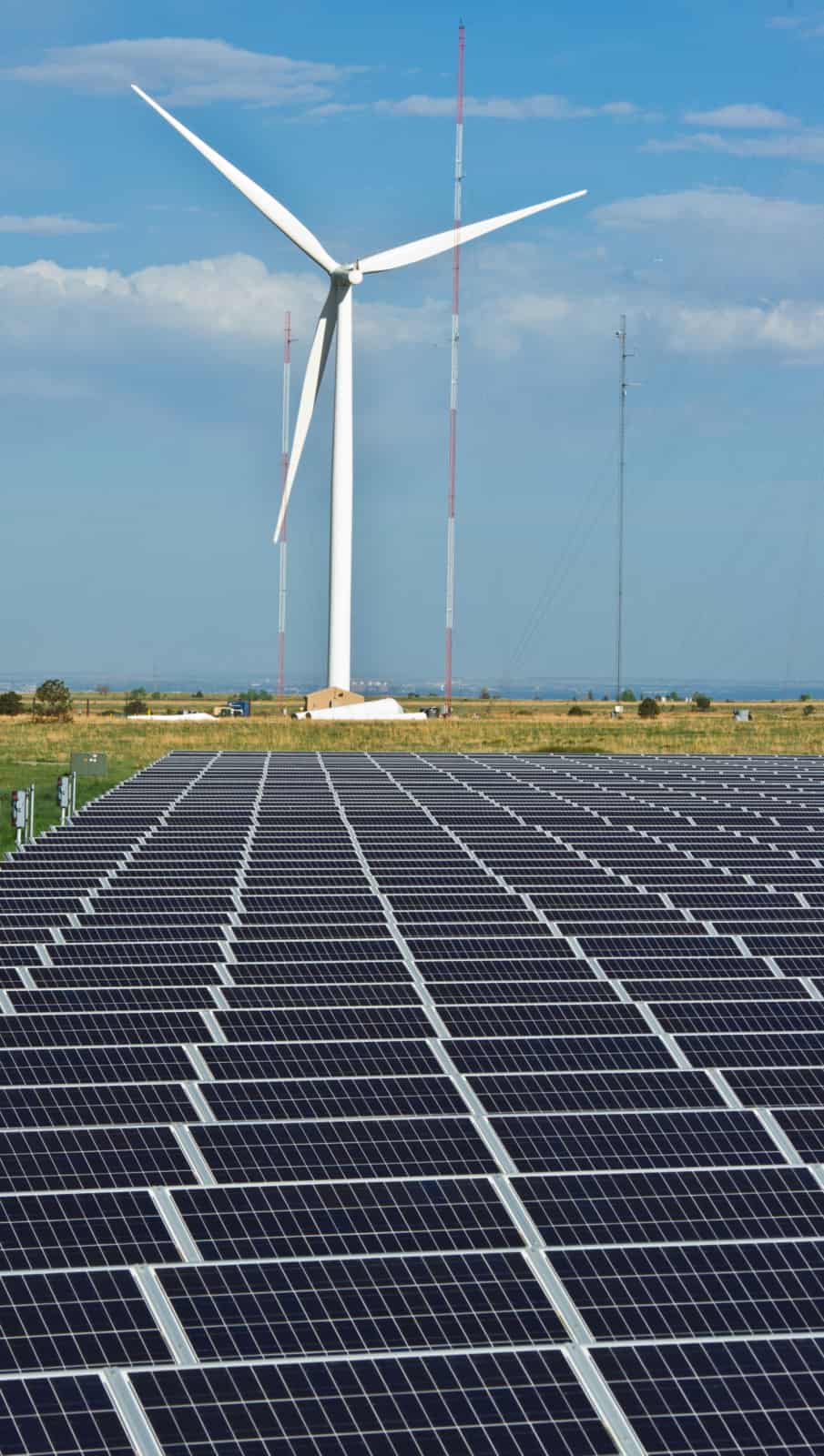 May 03, 2012-A muliti-megawat wind tubine and 1 megawatt PV field work together to produce energy at NREL's National Wind Technology Center (NWTC). The turbine can produce energy at night and on cloudy days and the PV field can produce energy during windl