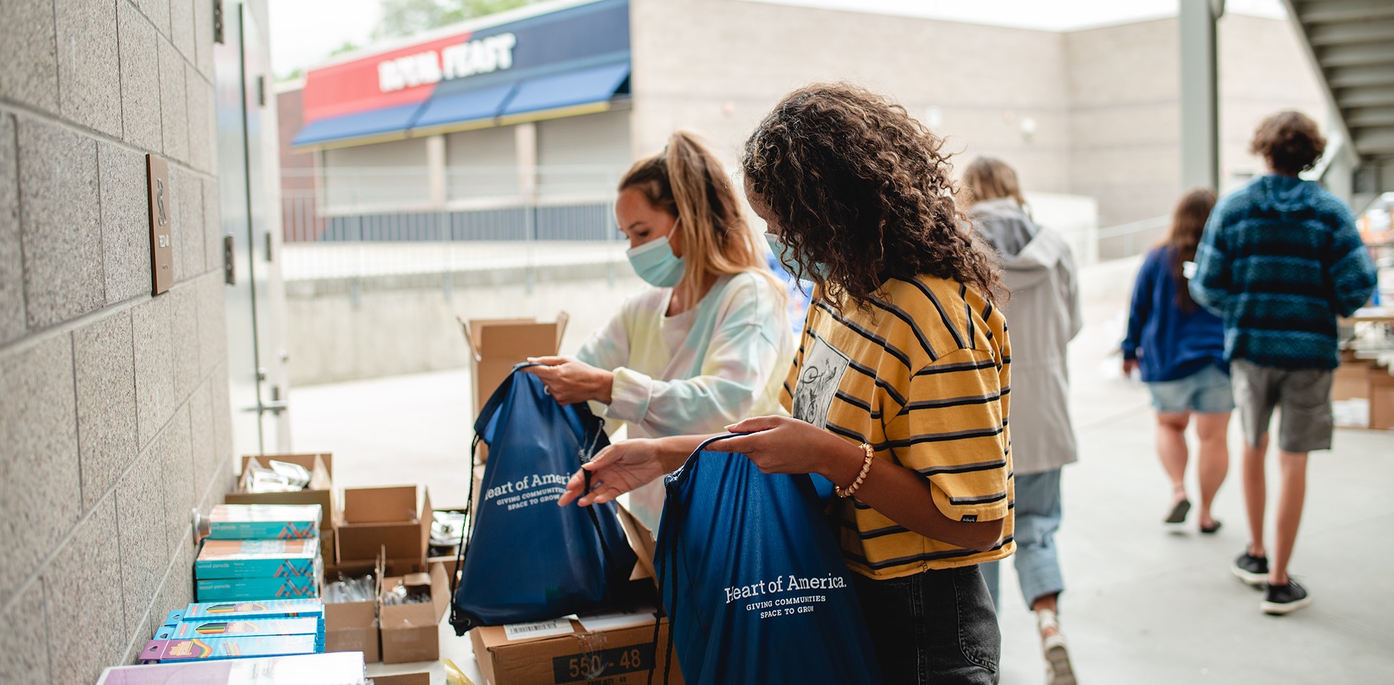 Volunteers build distance learning kits