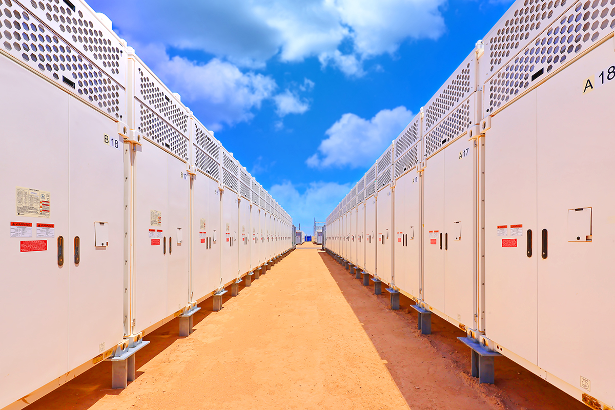 View between rows of energy storage containers.