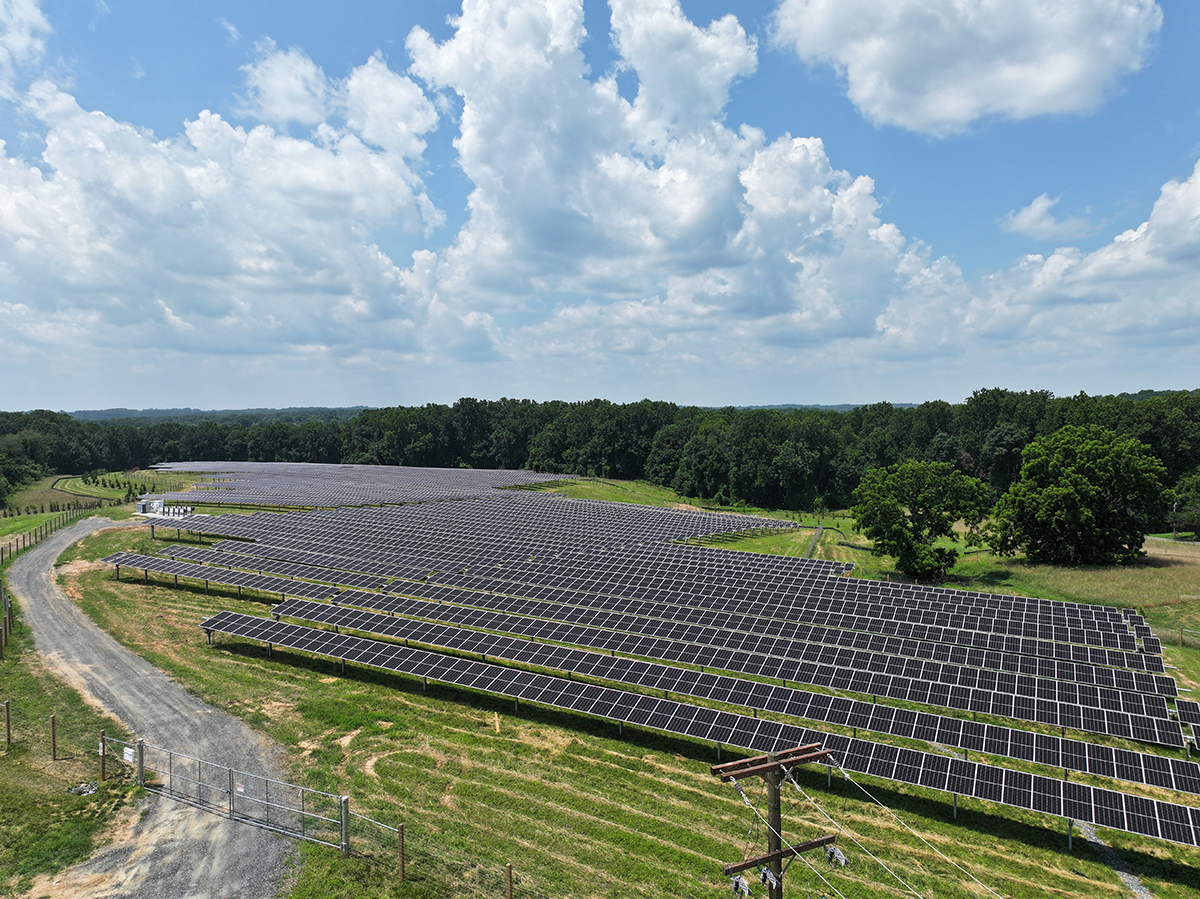 Aerial photo of a solar array on a beautiful day